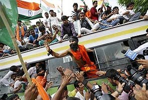 Baba Ramdev outside bus_window_295x200